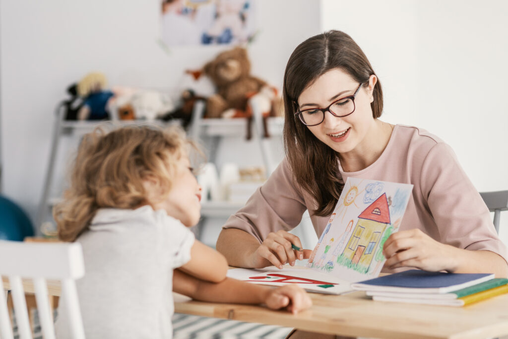 child talking with a therapist