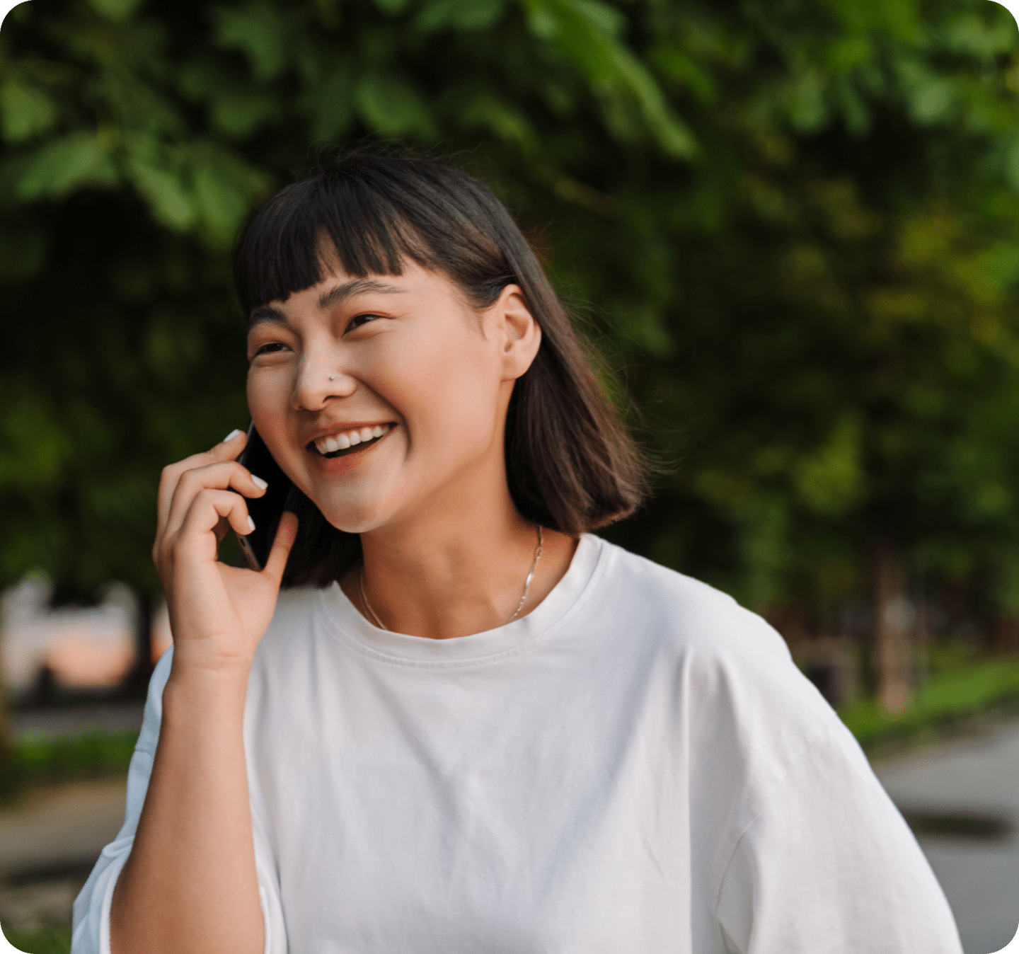 woman on phone smiling