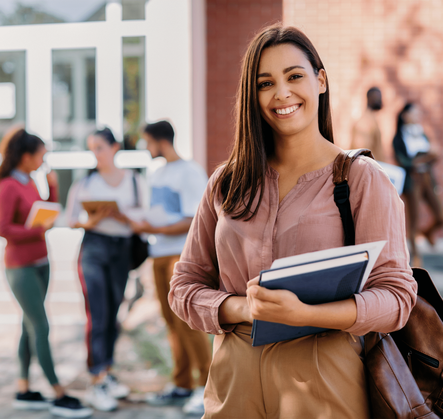 female student holding book