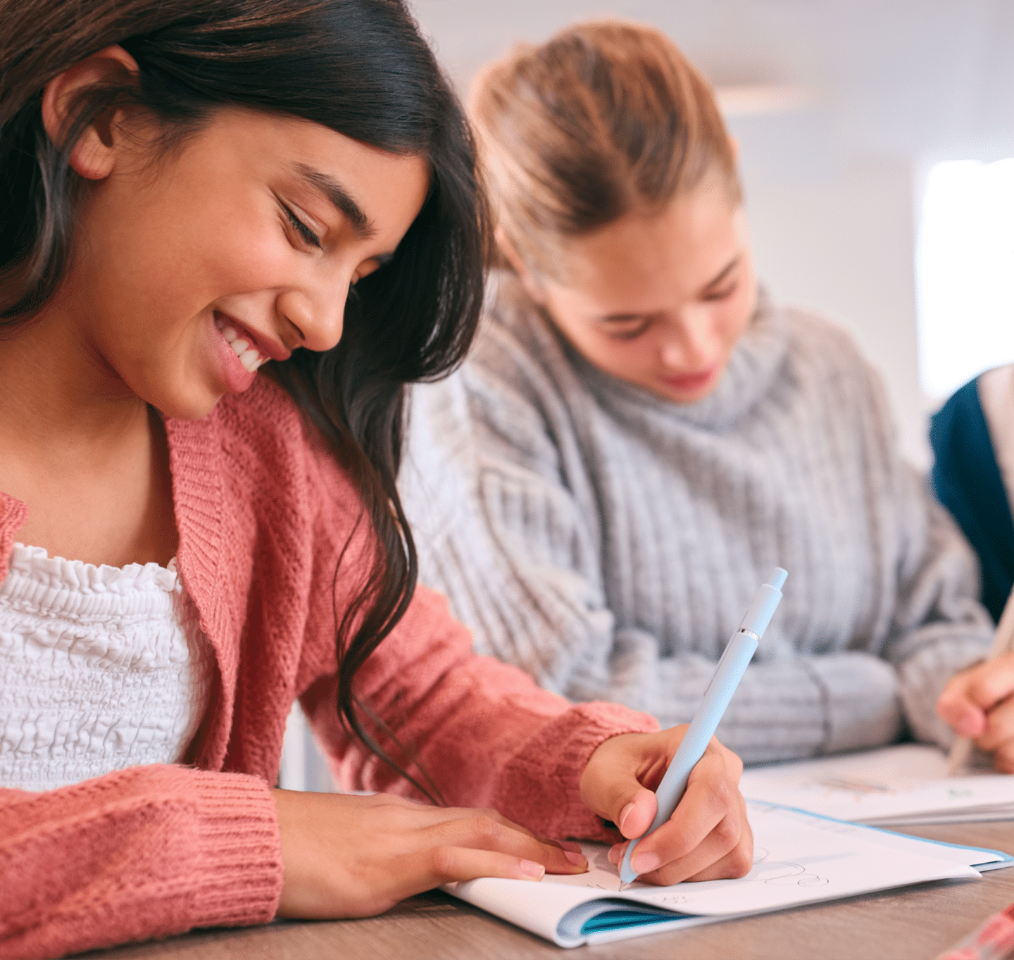 a female student writing at school